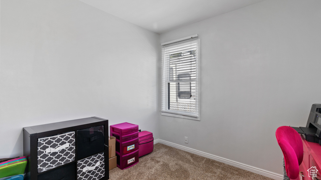 Game room featuring baseboards and carpet flooring