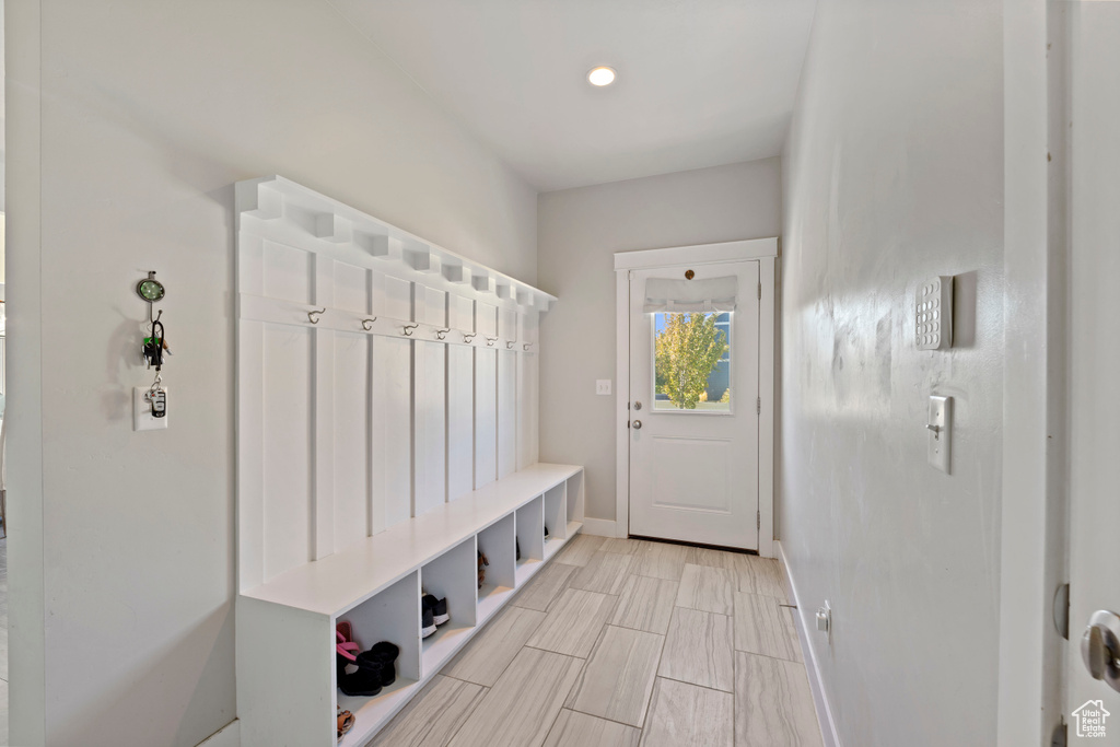 Mudroom featuring baseboards