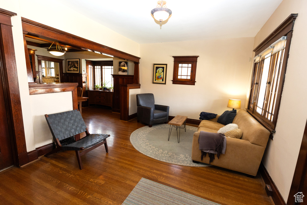 Living room with baseboards and wood finished floors
