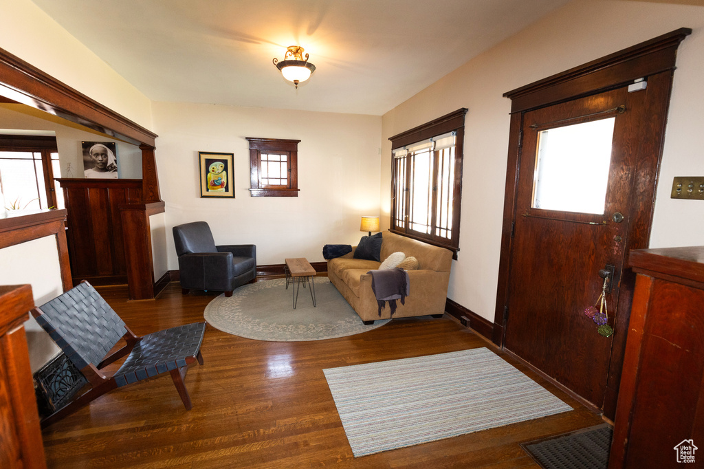 Interior space featuring baseboards and wood finished floors