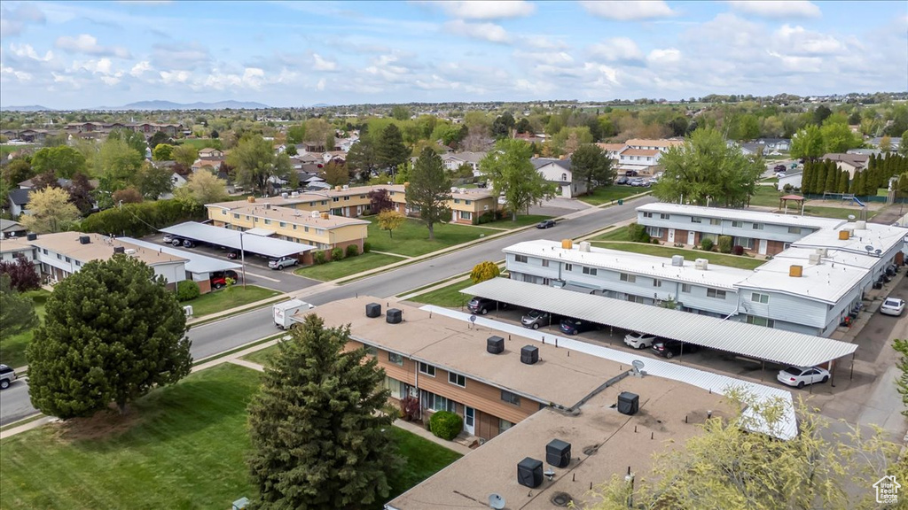 Birds eye view of property featuring a mountain view and a residential view