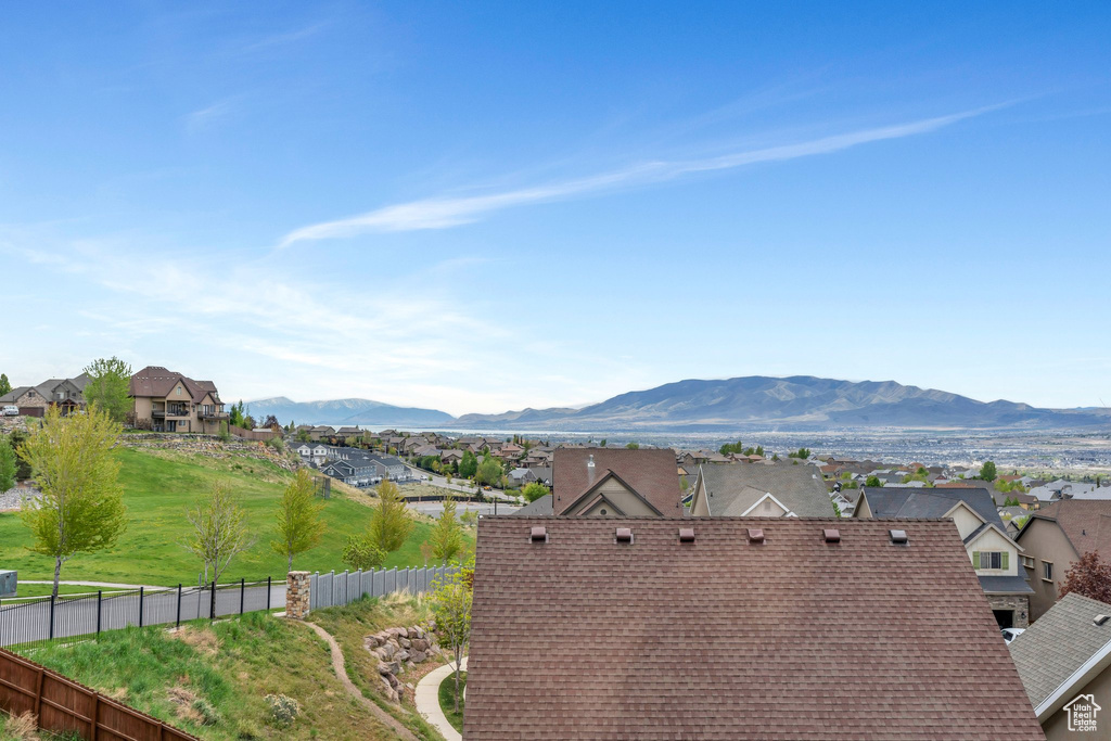 Property view of mountains featuring a residential view