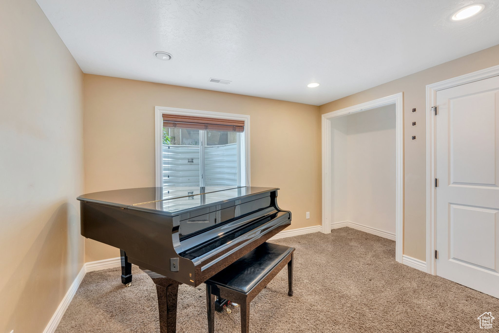 Sitting room featuring carpet floors, recessed lighting, baseboards, and visible vents