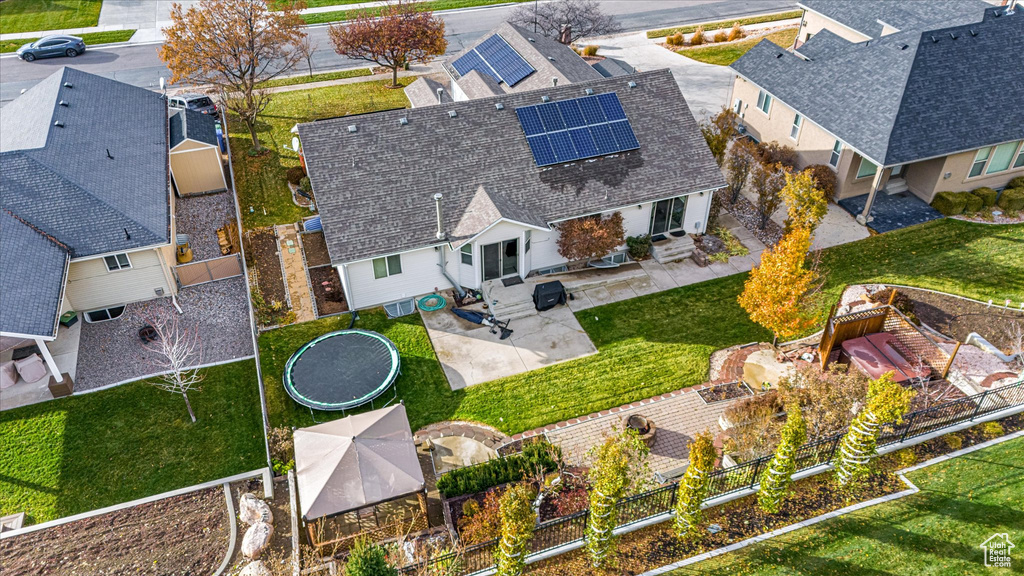 Birds eye view of property with a residential view