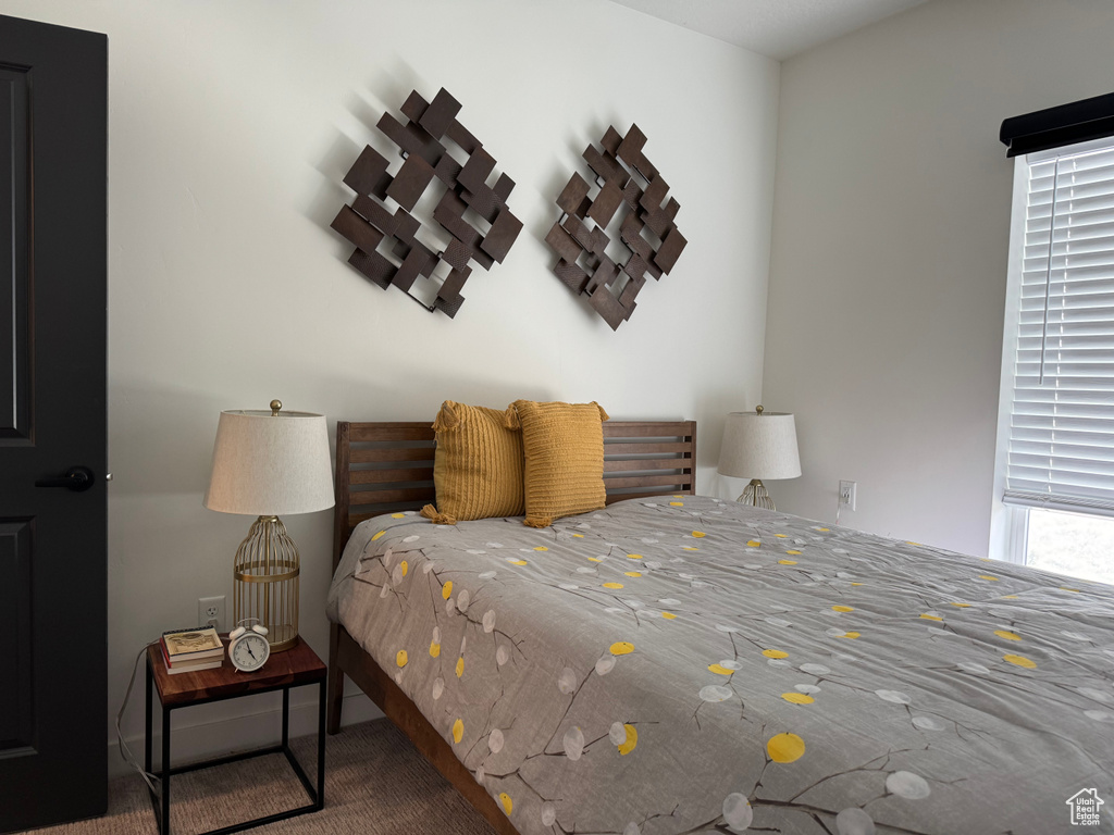 Bedroom with carpet floors