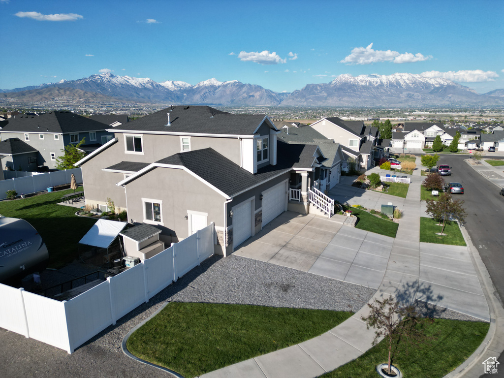 Aerial perspective of suburban area featuring mountains