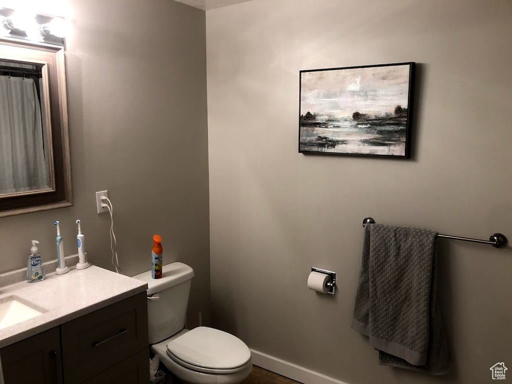 Bathroom with vanity and toilet