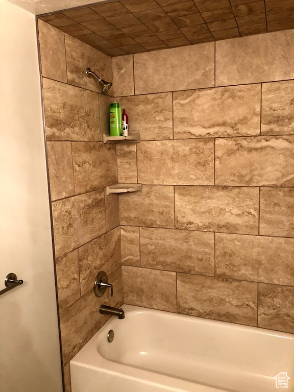 Bathroom featuring shower / bath combination