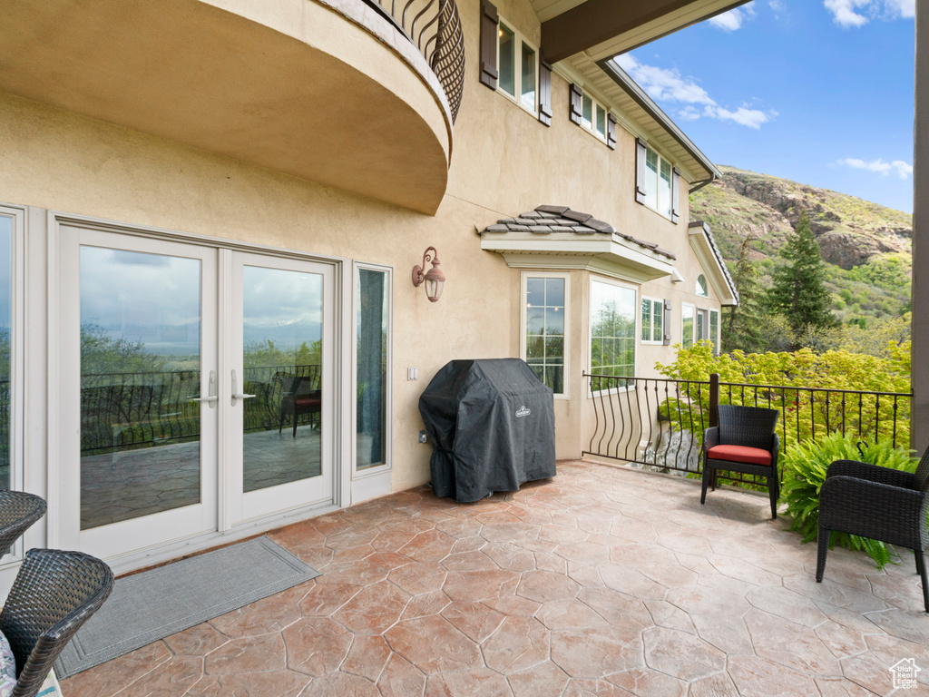 View of patio / terrace featuring a mountain view and area for grilling