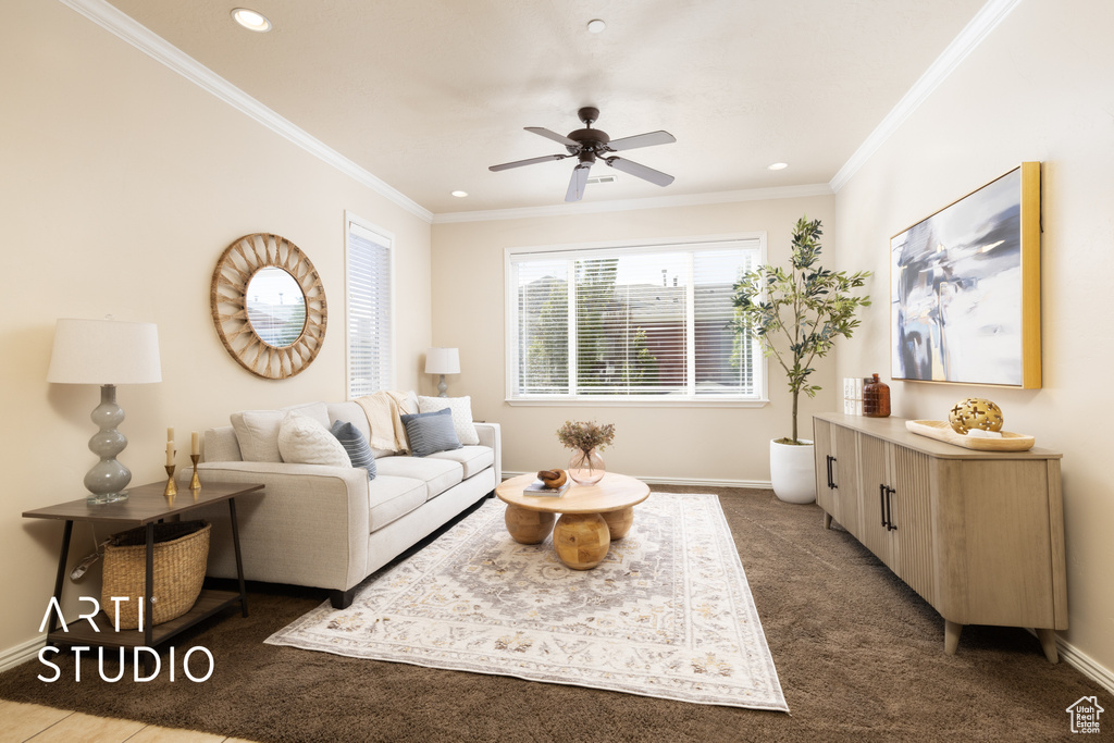 Living area featuring crown molding, a ceiling fan, baseboards, and recessed lighting