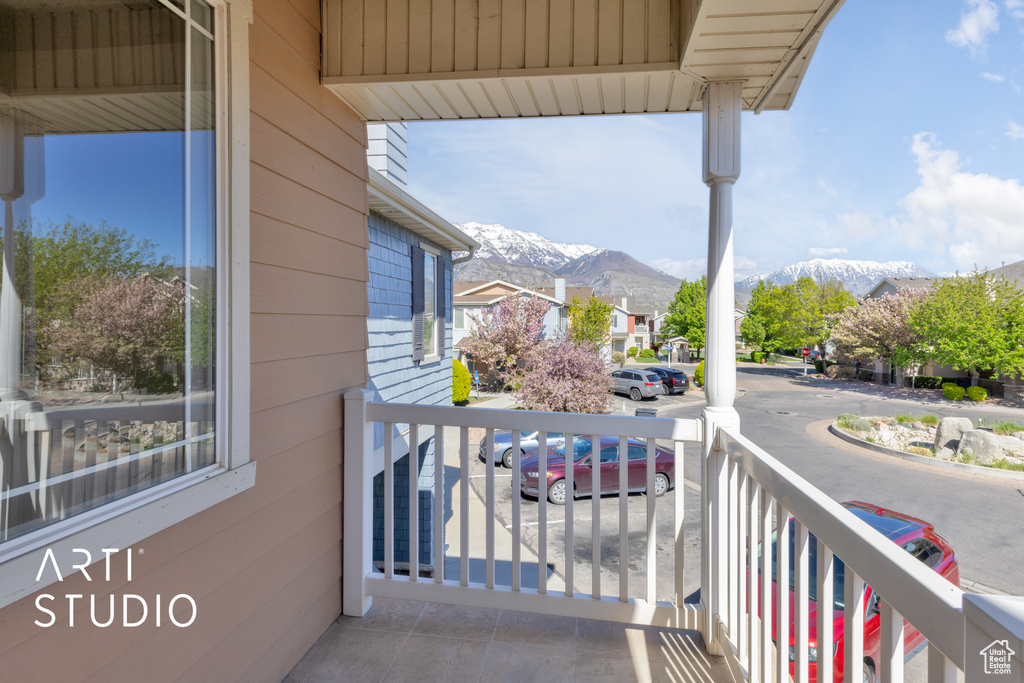 Balcony with a porch and a mountain view