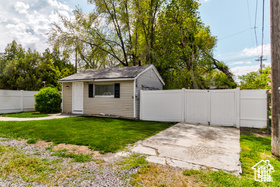 Exterior space featuring fence and a gate