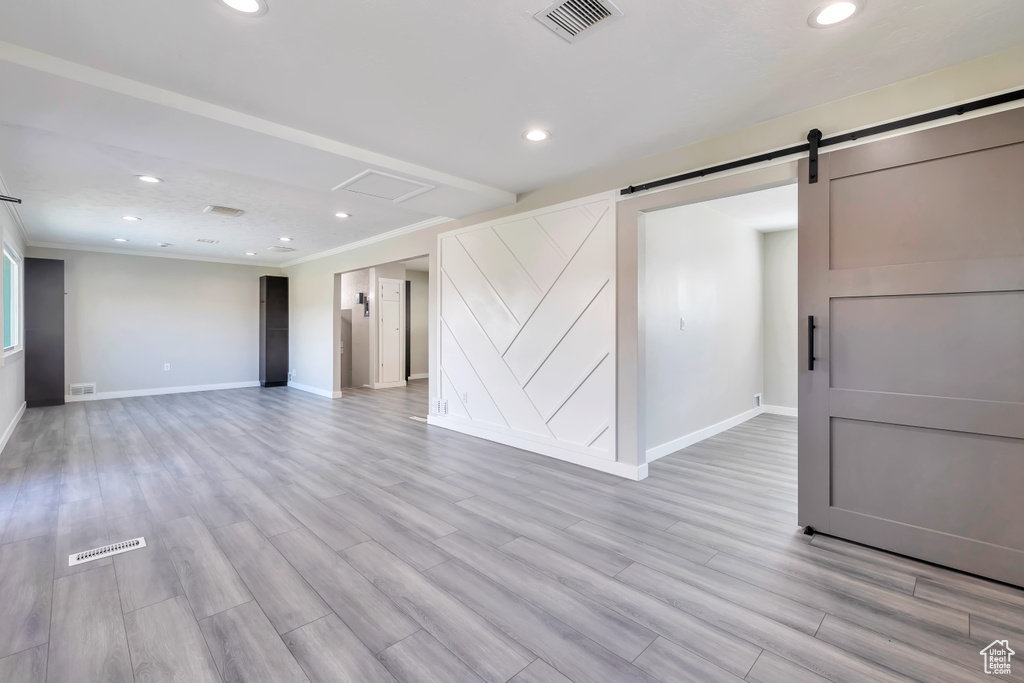 Basement with recessed lighting, baseboards, and visible vents
