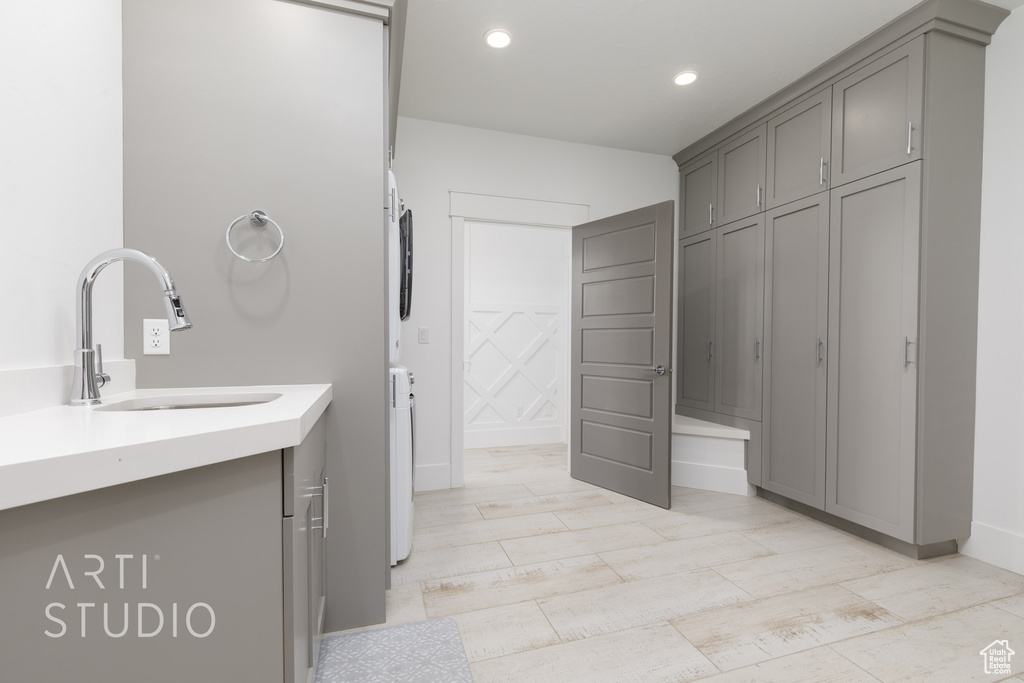Bathroom featuring recessed lighting and vanity