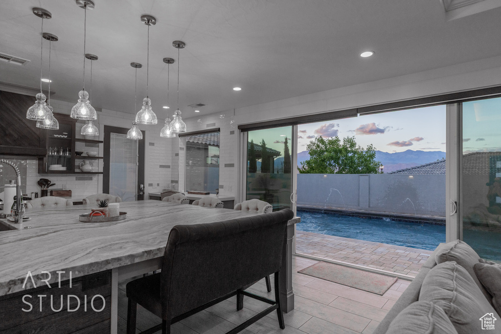Dining room featuring visible vents and recessed lighting