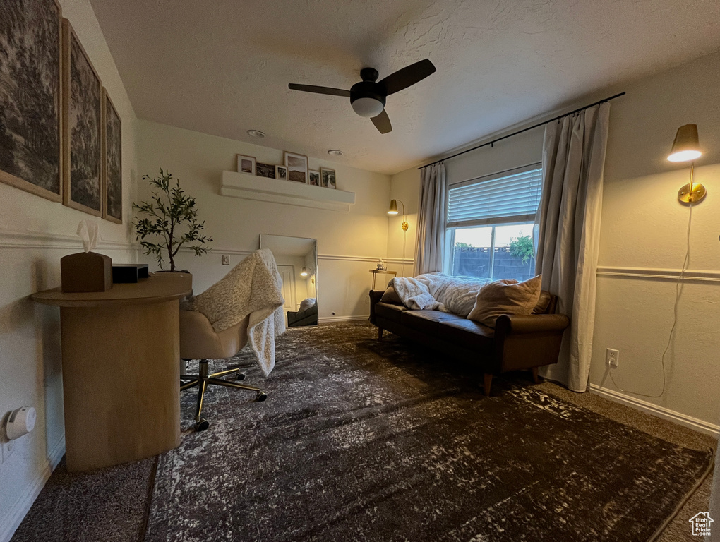 Bedroom featuring baseboards and ceiling fan