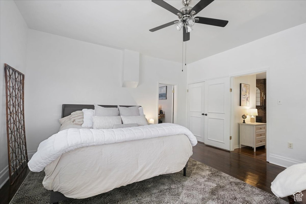 Bedroom featuring wood finished floors, ceiling fan, and baseboards