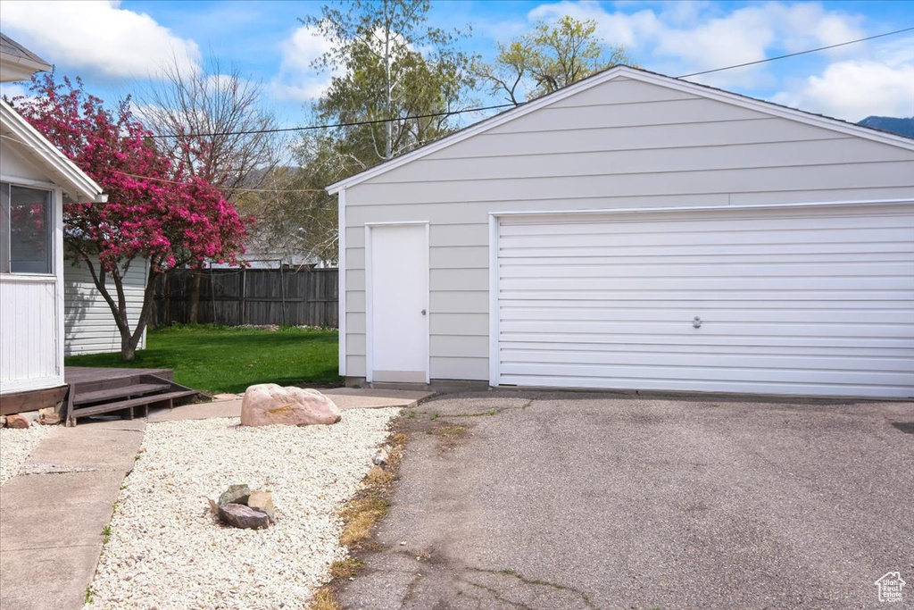 Detached garage with fence