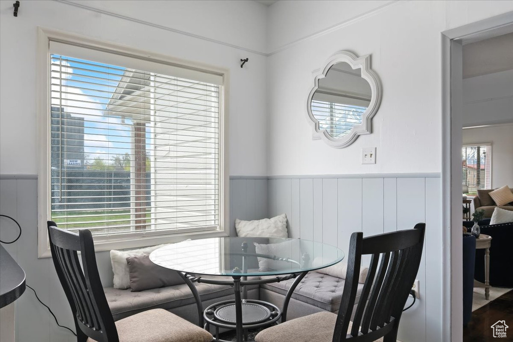 Dining room featuring wainscoting