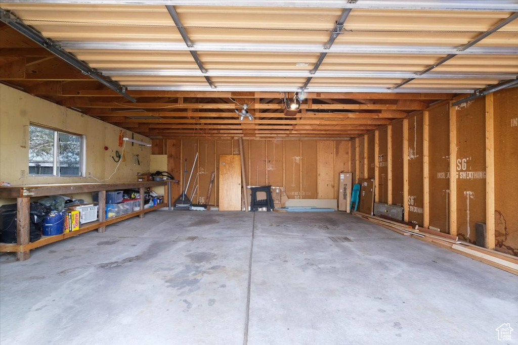 Garage featuring a garage door opener