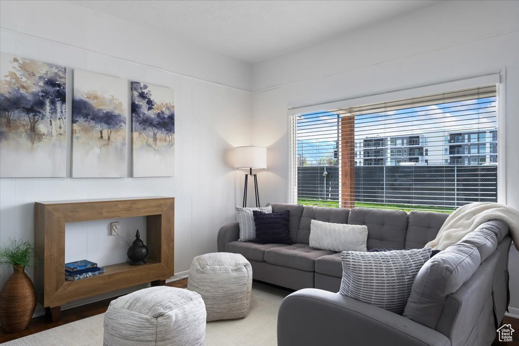 Living area with wood finished floors