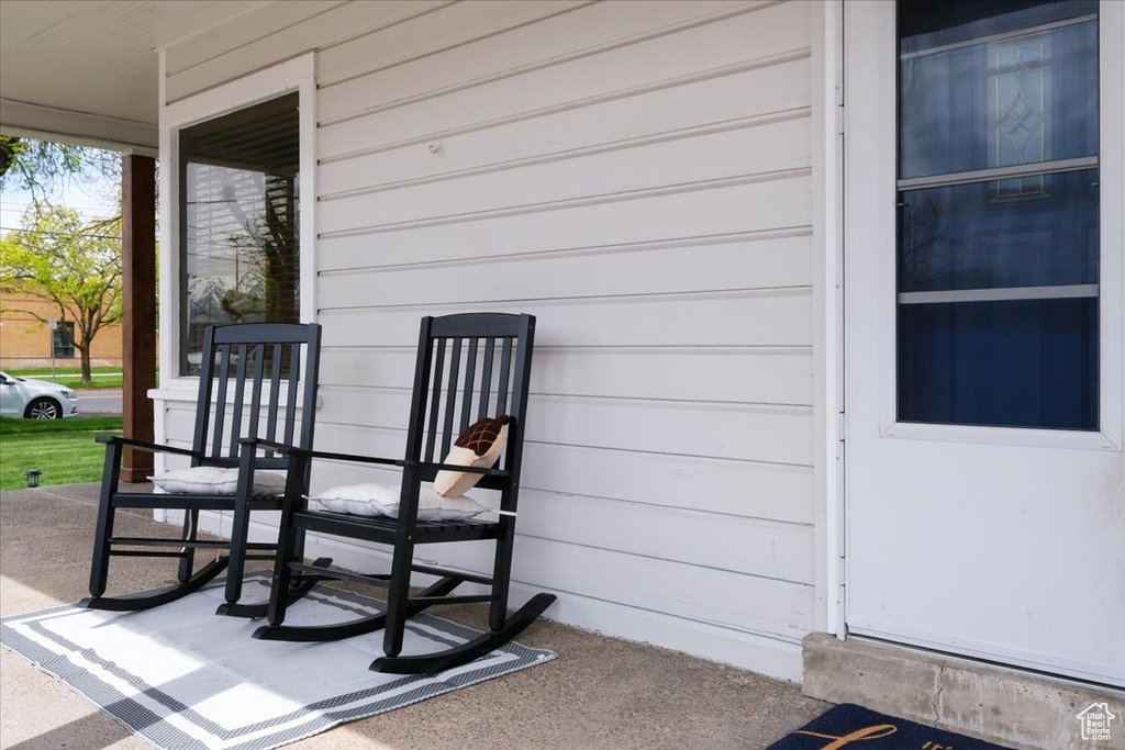 View of patio with a porch