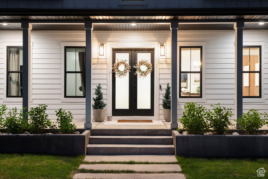 Doorway to property with a porch