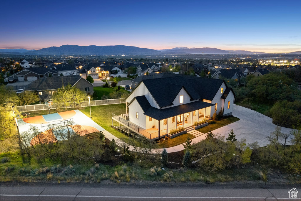 Birds eye view of property featuring a residential view and a mountain view