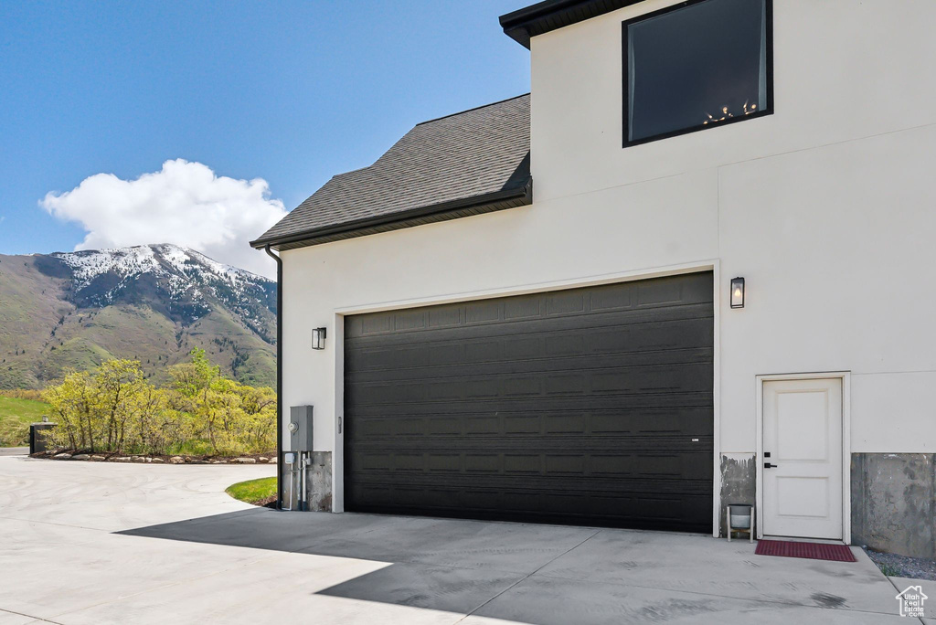 Garage featuring a mountain view
