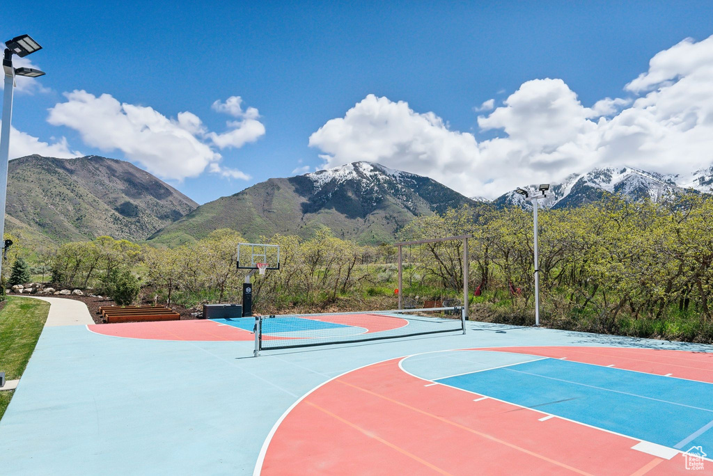 View of basketball court with a mountain view and community basketball court
