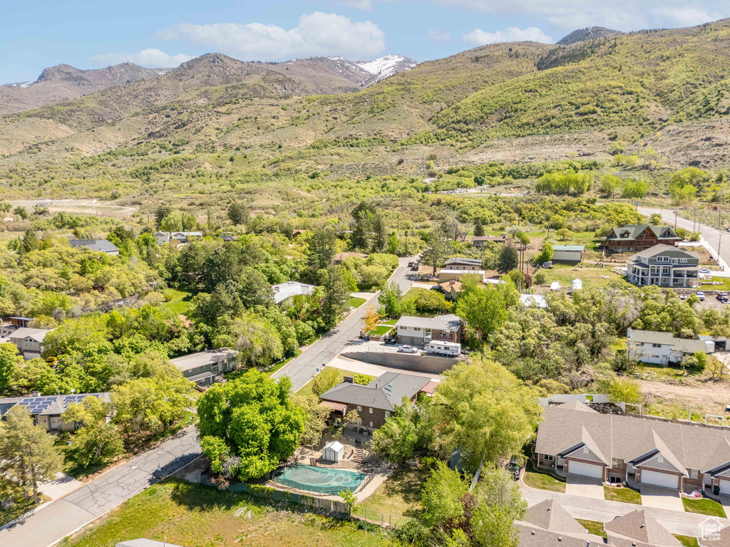 Drone / aerial view with a residential view and a mountain view