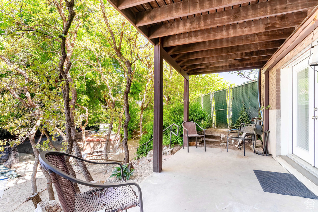 View of patio / terrace featuring fence