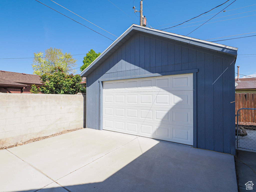 Detached garage with fence