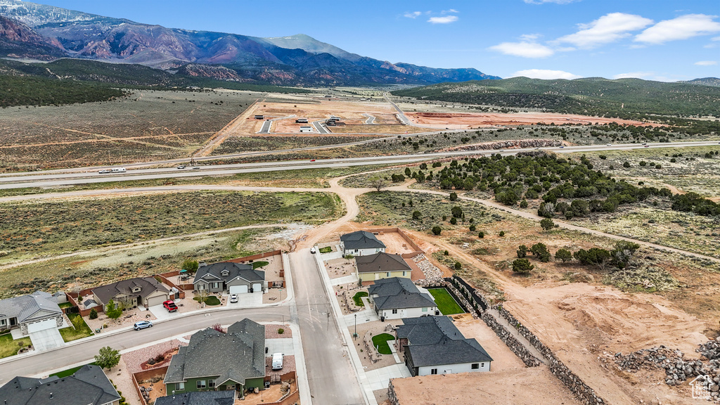 Birds eye view of property featuring a residential view and a mountain view