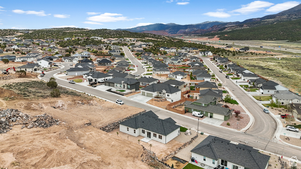 Drone / aerial view featuring a residential view and a mountain view
