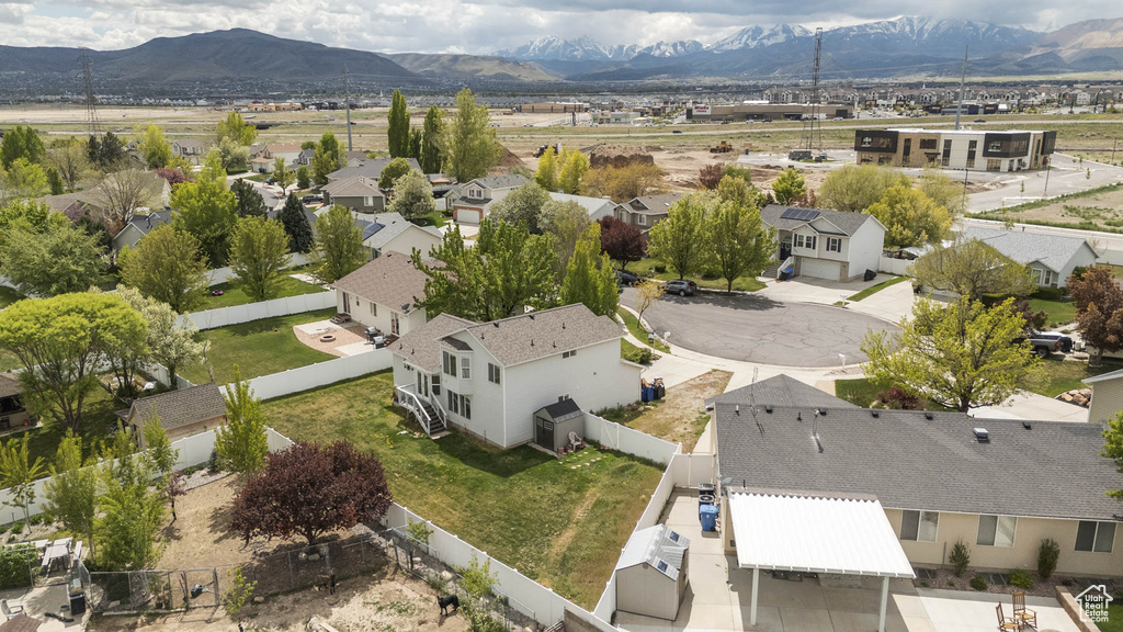 Drone / aerial view featuring a residential view and a mountain view