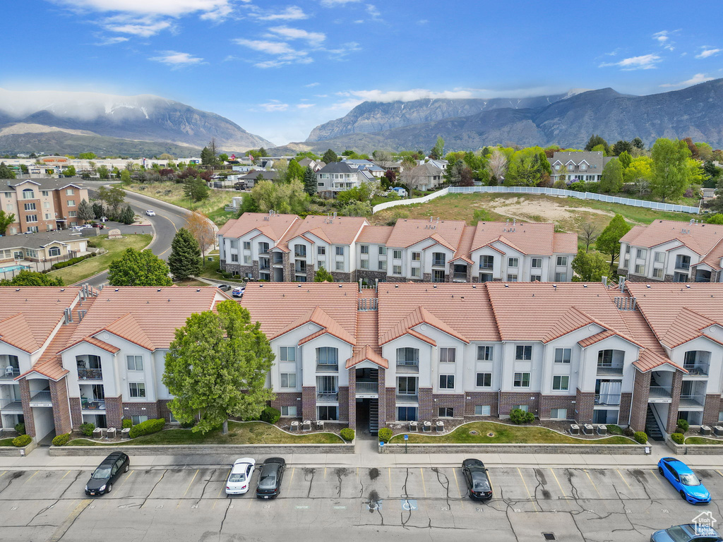 Drone / aerial view with a mountain view and a residential view