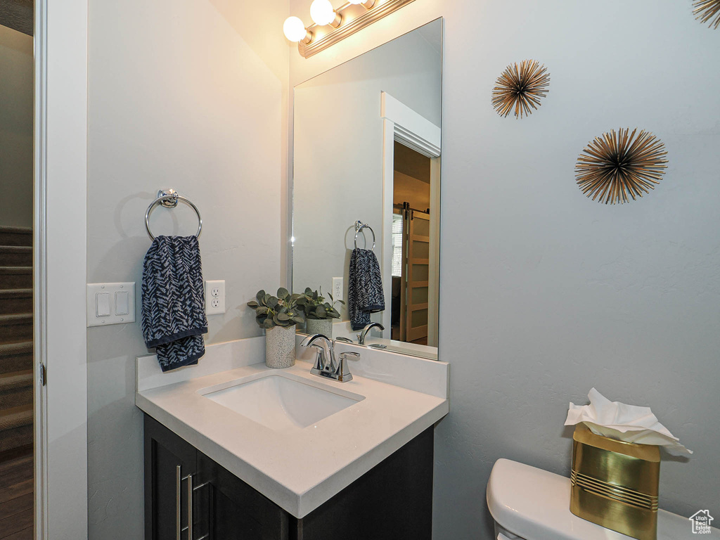 Bathroom with toilet and vanity