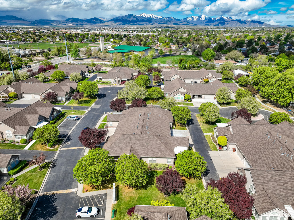 Drone / aerial view featuring a residential view and a mountain view