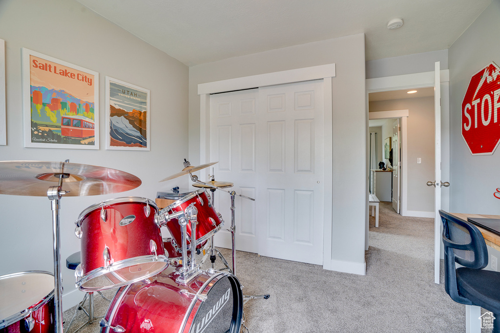 Game room featuring carpet flooring and baseboards