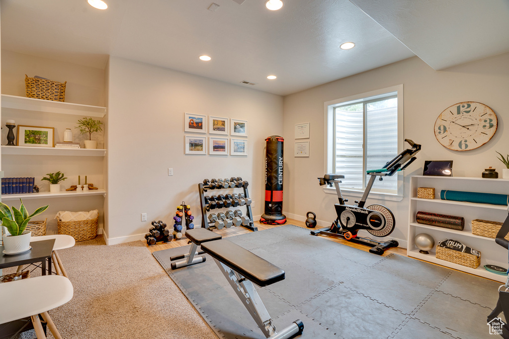 Workout area featuring baseboards, recessed lighting, and visible vents