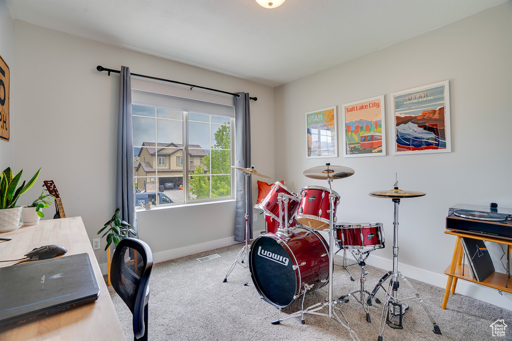 Playroom featuring baseboards, carpet, and visible vents