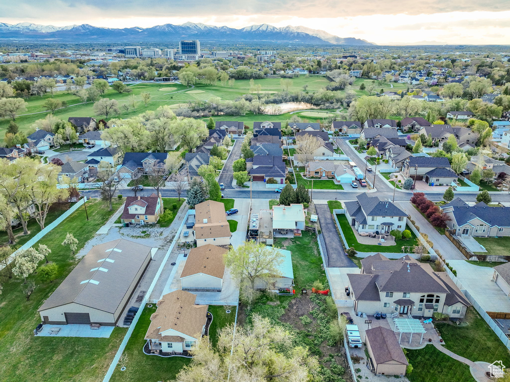 Birds eye view of property with a residential view, a mountain view, and golf course view