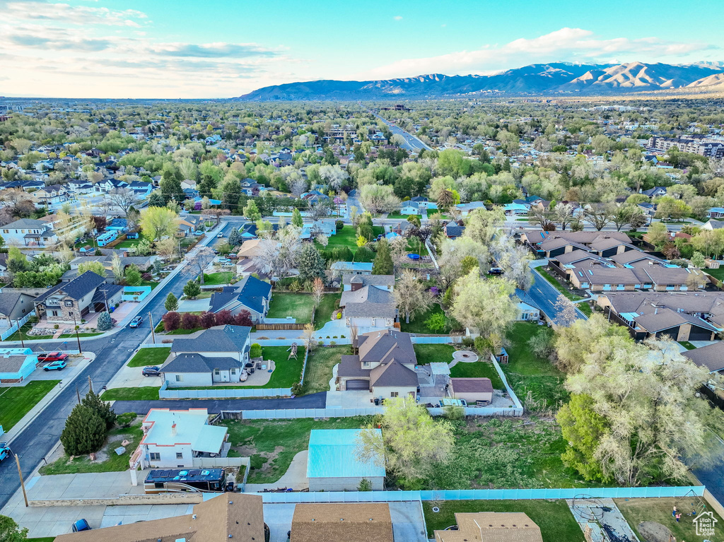 Drone / aerial view with a residential view and a mountain view