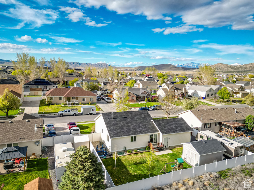 Drone / aerial view featuring a mountain view and a residential view