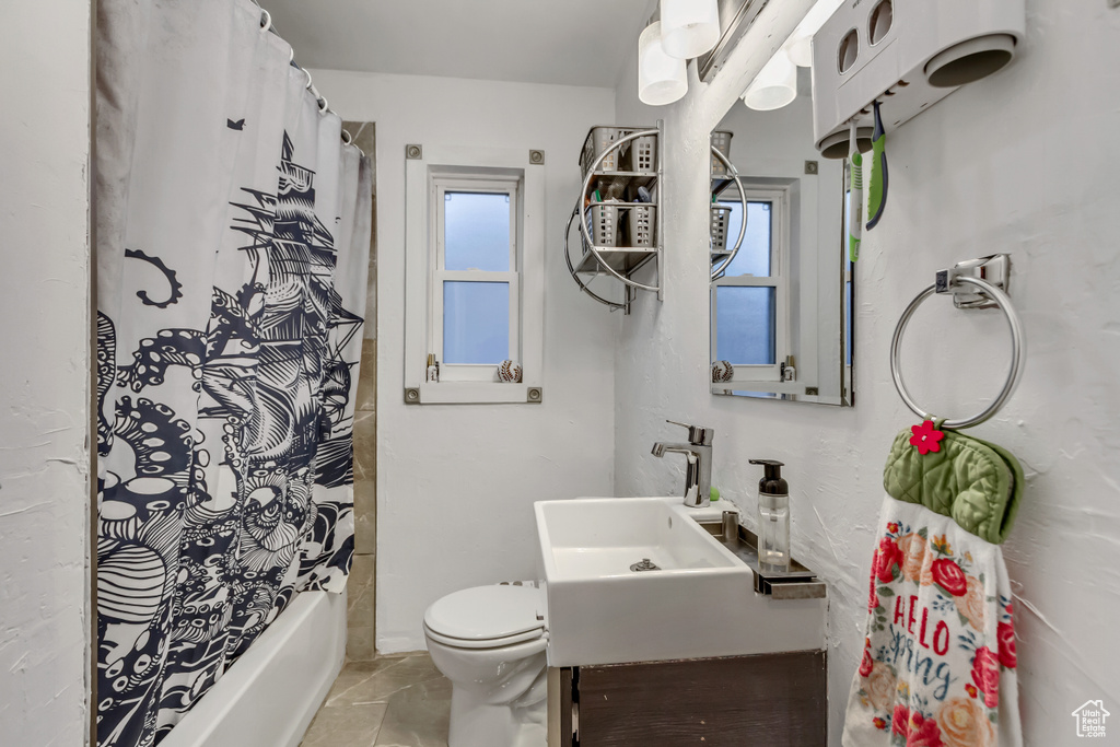 Full bath with toilet and vanity