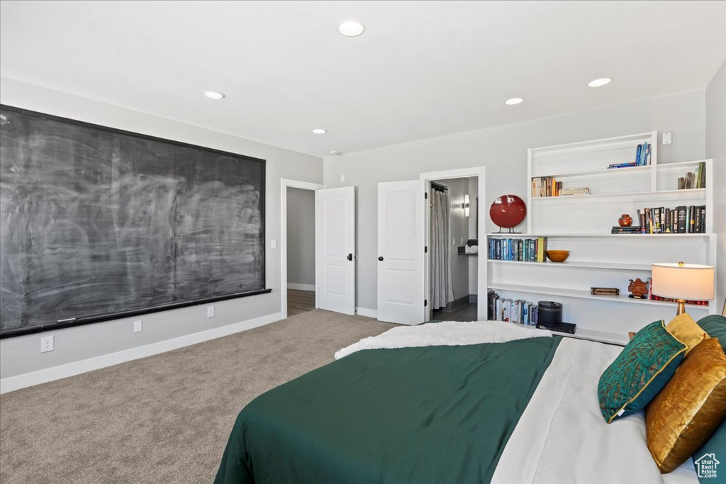 Bedroom with carpet flooring, recessed lighting, and baseboards