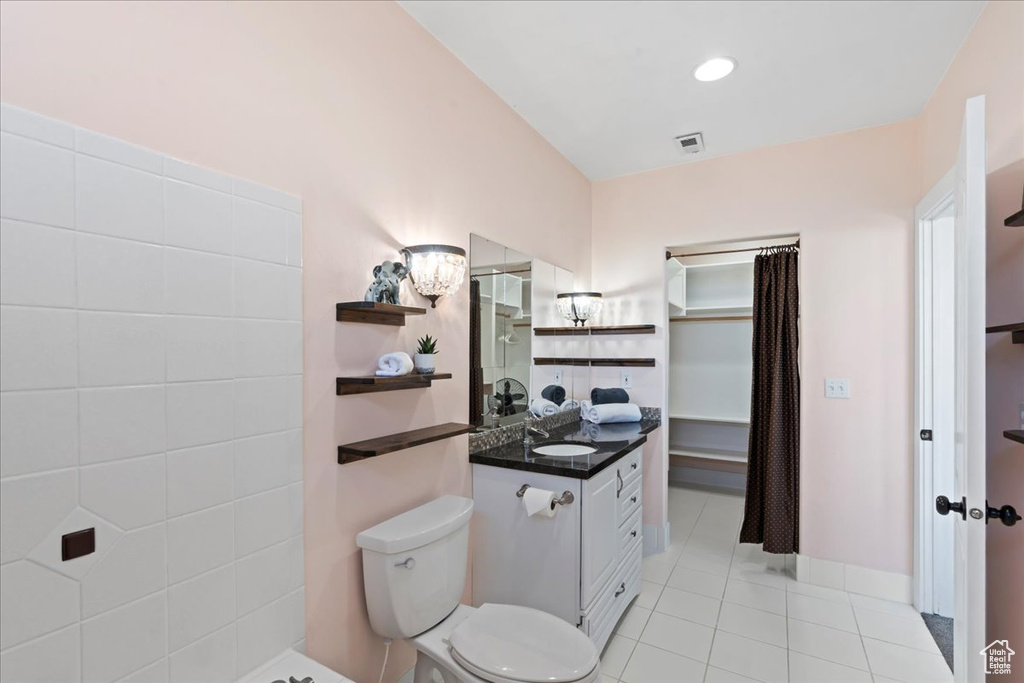 Full bathroom featuring visible vents, vanity, tile patterned floors, toilet, and recessed lighting