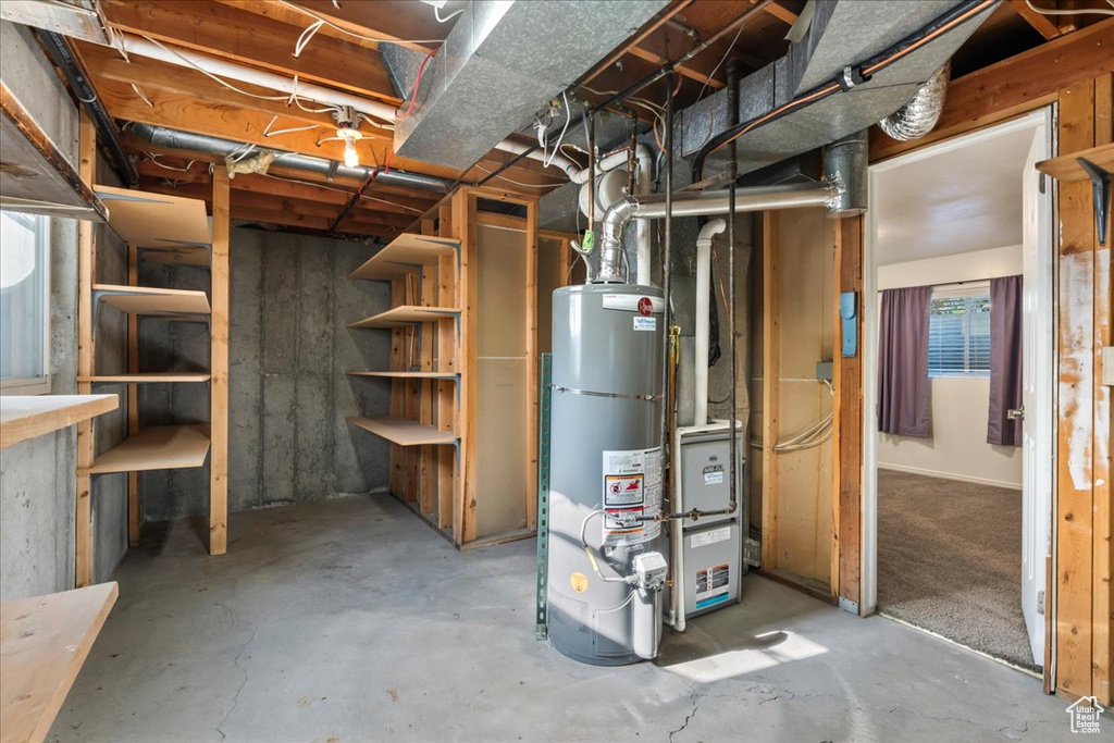 Below grade area featuring gas water heater