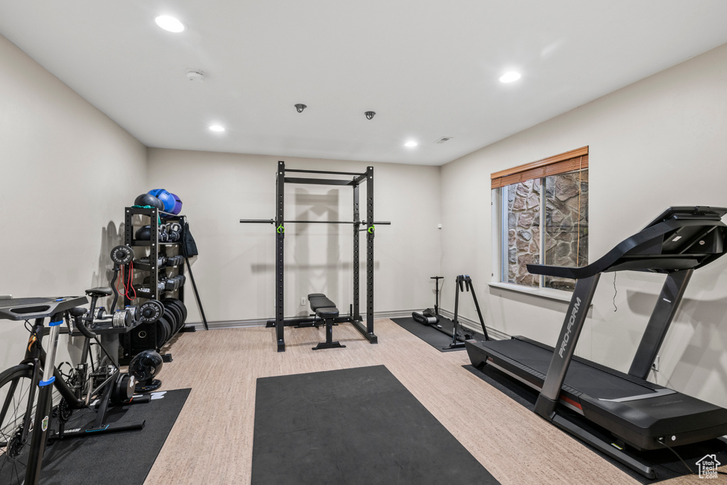 Workout room featuring recessed lighting and baseboards